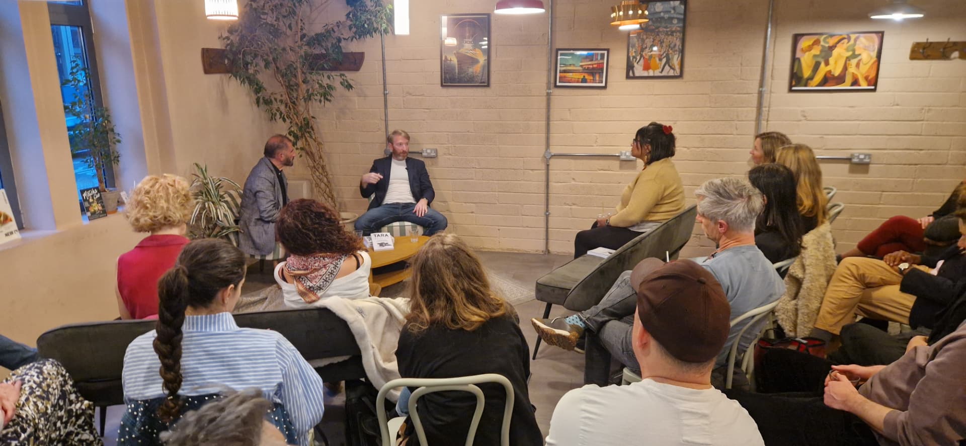 Audience listening at a Rose & Sword book launch